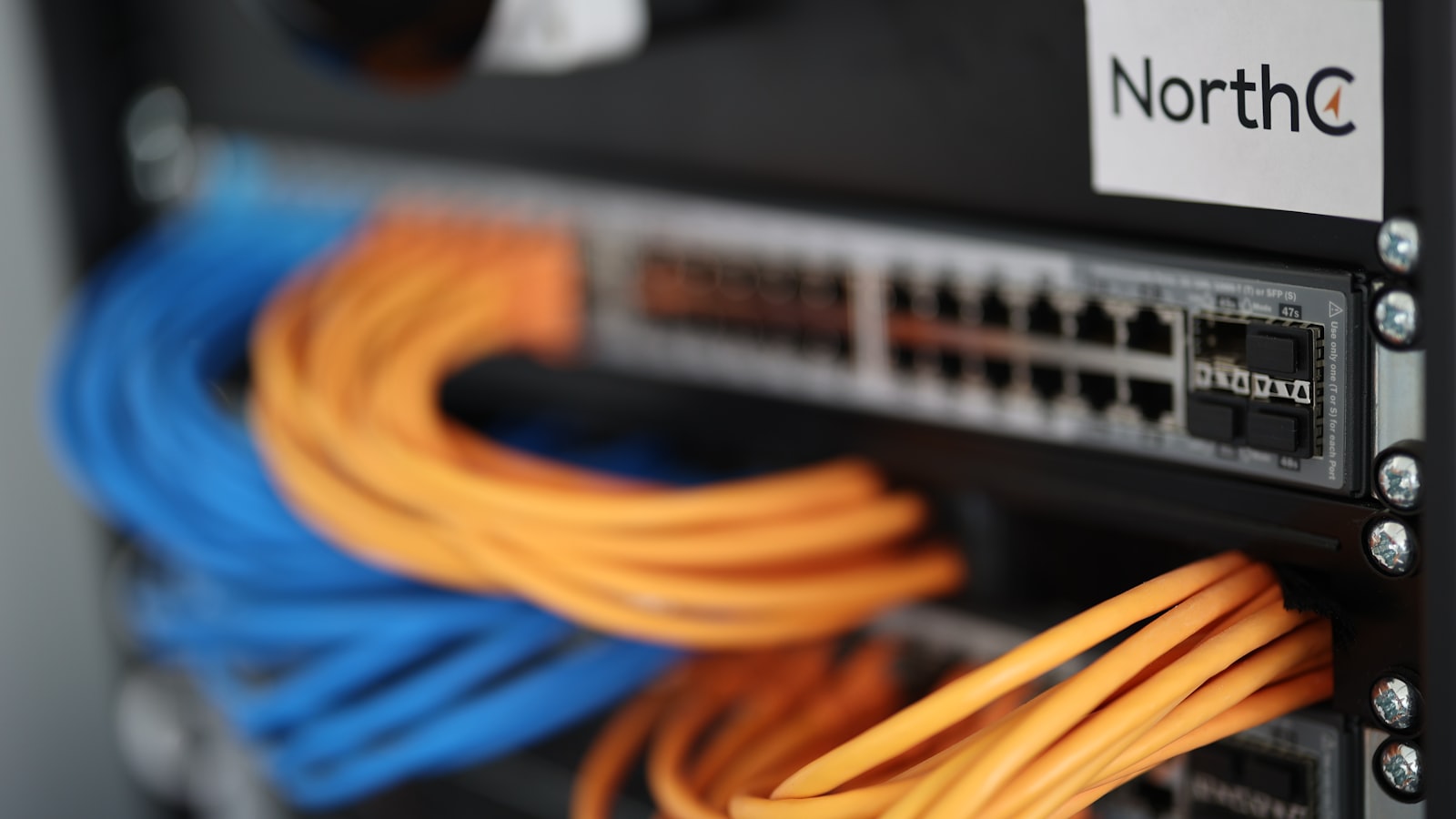 A close-up of a network switch box